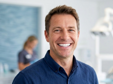 Patient smiling during a dental visit